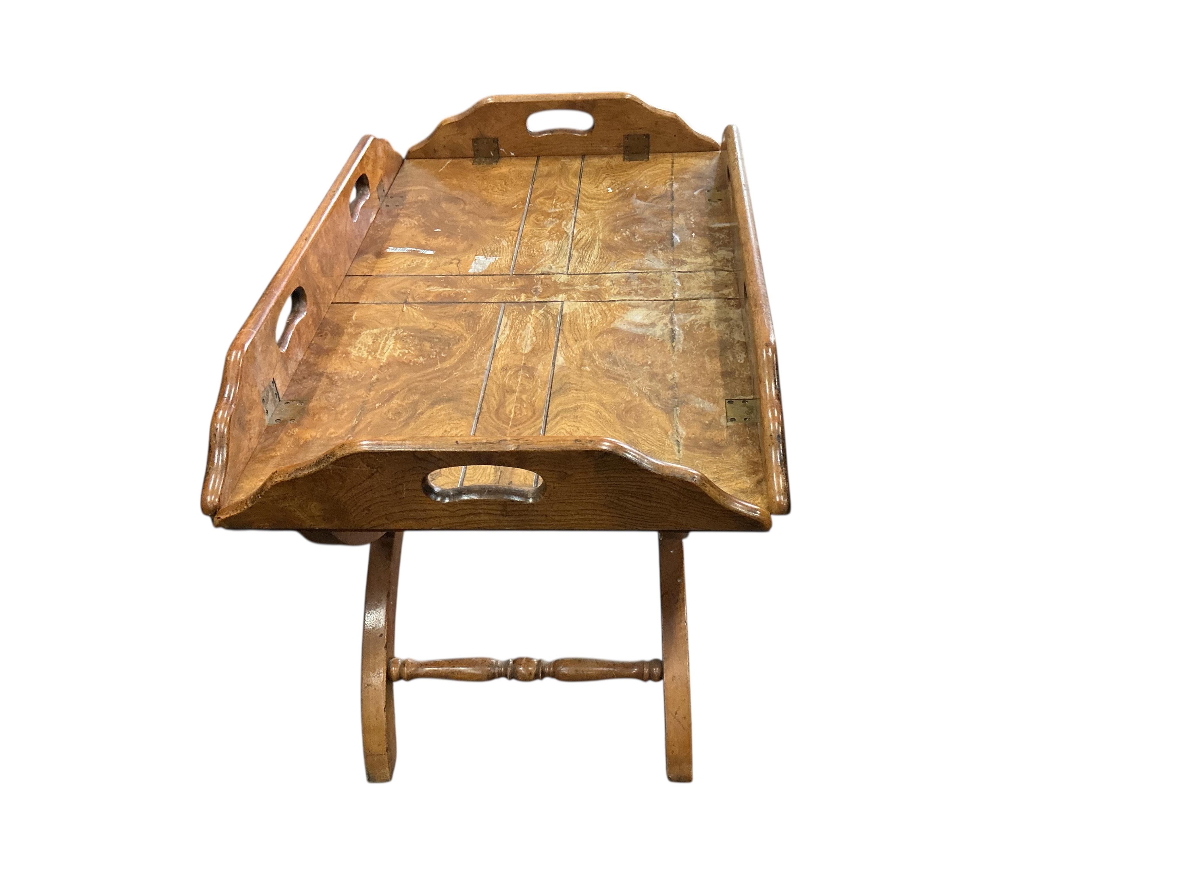 A reproduction burr oak folding butler’s tray on stand, width 84cm, depth 54cm, height 58cm